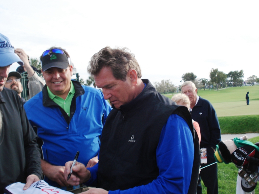 1.10 Andy getting an autograph from Joe Theisman after he played w Els 2008 Honda Classic