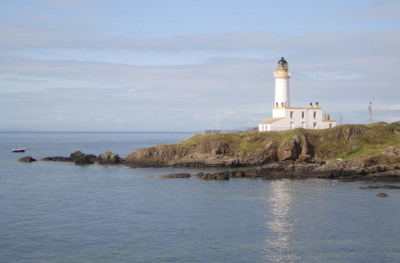 a-turnberry-lighthouse-w-reflecion-and-boat