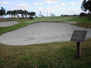 One of nine practice bunkers- this one has a flat bottom and very course sand. 