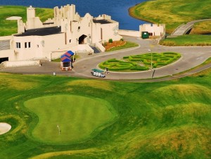 The 9th green at The Wizard sits in front of the Scottish castle clubhouse. Photo Credit: Mystical Golf