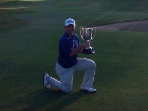 Champion golfer Greg Chalmers takes a knee after an exhausting playoff!
