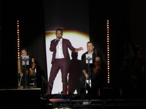 John Legend in the spotlight lights up the light in other people's lives.