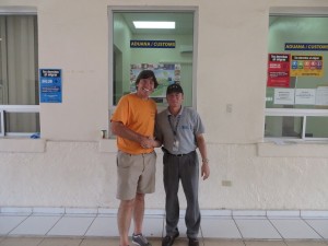 With Roger the Honduras Customs Official who rescued and helped me get all my paperwork finished!