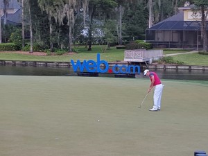Emiliano Grillo stroking his putt and ringing the bell to win the Web.com Tour Championship on the 18th green on Dye's Valley.